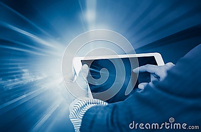 Woman with tablet in divergent rays Stock Photo