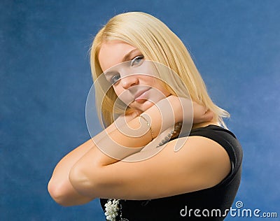 Woman touching her neck Stock Photo
