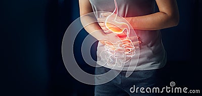 Woman touching stomach painful suffering from stomachache. Stock Photo