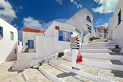 A woman tourist in Dryopida of Kythnos island, Greece Stock Photo