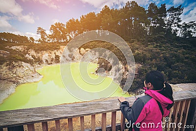 Tourist at Devil`s cave pool in Rotorua Editorial Stock Photo