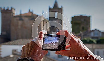 Woman Tourist Photographing Scenic View. Stock Photo