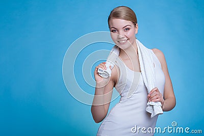 Woman with a towel around her shoulders smiling Stock Photo