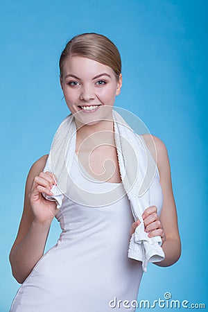 Woman with a towel around her shoulders smiling Stock Photo