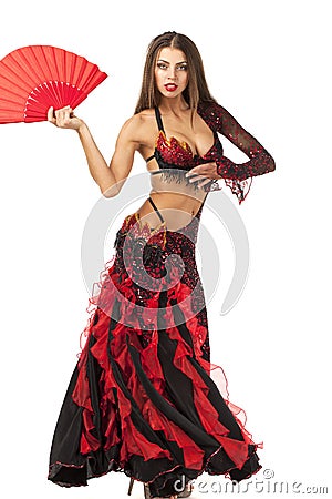 Woman traditional Spanish Flamenco dancer dancing in a red dress Stock Photo