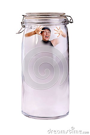 Woman Trapped In A Jar Stock Photo