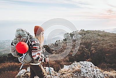 Woman Traveler with backpack mountaineering Stock Photo