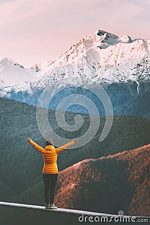 Woman traveler enjoying mountains landscape Stock Photo
