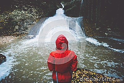 Woman Traveler hiking at waterfall Travel Lifestyle Stock Photo