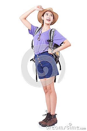 Woman traveler standing on the floor with backpack Stock Photo