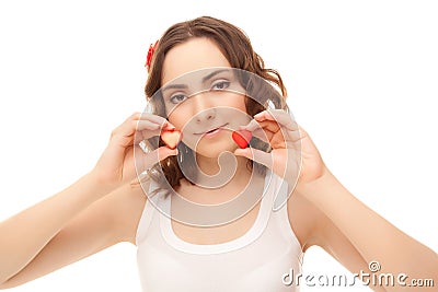 Woman with two heart-shaped candy Stock Photo