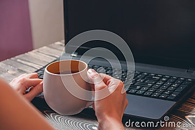 Woman typing on laptop Stock Photo