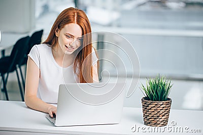 Woman typing on laptop at workplace Woman working in home office hand keyboard Stock Photo