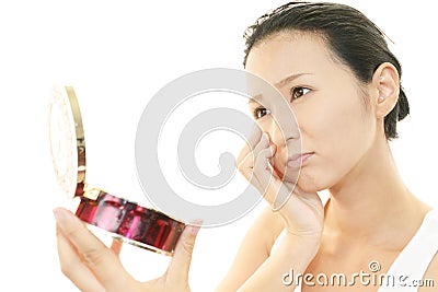 Woman uneasy look. Stock Photo