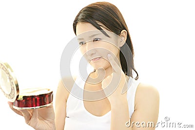 Woman uneasy look. Stock Photo