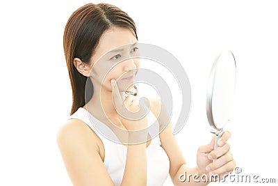 Woman uneasy look. Stock Photo