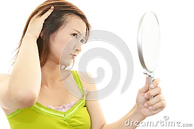 Woman uneasy look. Stock Photo