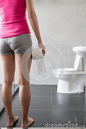 Woman with urine urgency Stock Photo