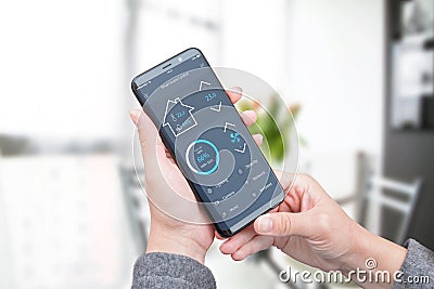 Woman use modern mobile app with modern flat design interface to control home security, lighting and air temperature Stock Photo