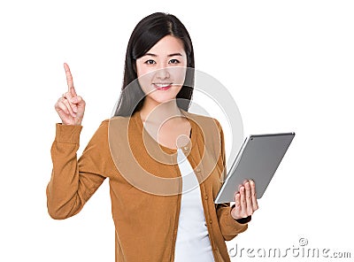 Woman use of tablet and funger point up Stock Photo