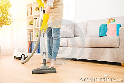 Woman use vacuum cleaner to cleaning Stock Photo