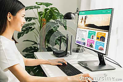 Woman using application booking flight travel search ticket holiday and hotel on website discounted price. Stock Photo