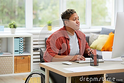 Woman using computer in work Stock Photo