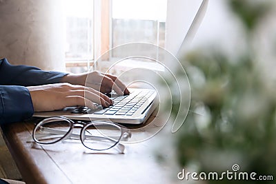 Woman Using Laptop, Searching Web, Browsing information, having workplace at coffee shop cafe Stock Photo