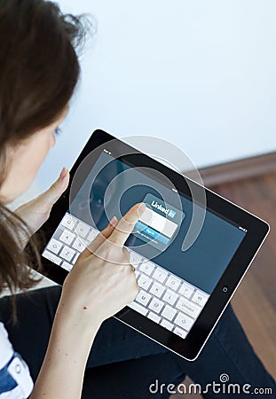 Woman using Linkedin Editorial Stock Photo