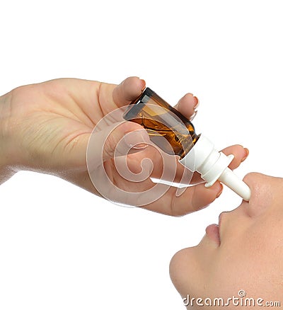 Woman using medicine nose spray nasal isolated Stock Photo