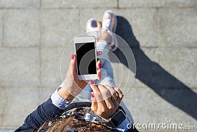 Woman using mobile phone Stock Photo