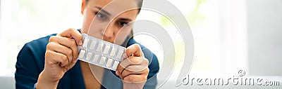 Woman Using Nicotine Gum To Quit Smoking Stock Photo