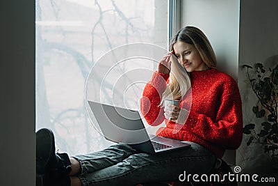 Woman using online dating app on laptop. Valentines Day, dating, meeting During The Coronavirus Outbreak. Love at Stock Photo