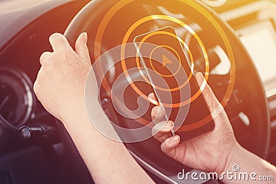 Woman using smartphone navigation app while driving car Stock Photo