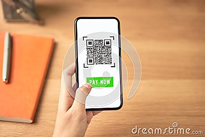 Woman using smartphone for qr code payment mobile banking on application wallet. Stock Photo