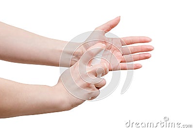 Woman is using spray sanitizer to disinfect her hands. Close up shot. Side view Stock Photo