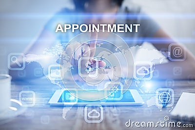 Woman using tablet pc, pressing on virtual screen and selecting appointment Stock Photo