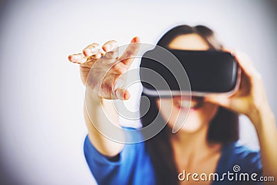 Woman using a virtual reality headset Stock Photo