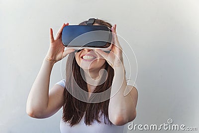 Woman using VR headset Stock Photo