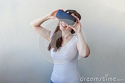 Woman using VR headset Stock Photo