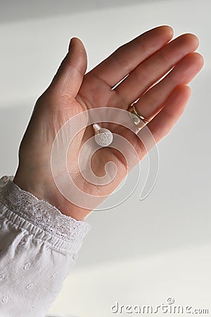 Woman and Vaginal Detox Pearls Stock Photo