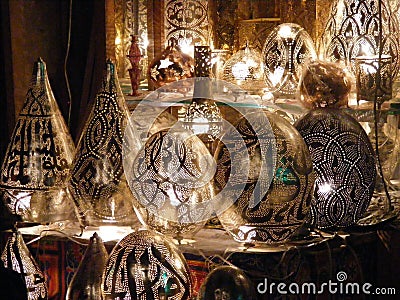 Shining lanterns in khan el khalili souq market with Arabic handwriting on it in egypt cairo Stock Photo