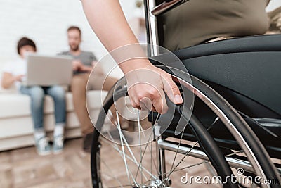 Woman veteran in wheelchair returned from army. Close-up photo veteran woman in a wheelchair. Stock Photo