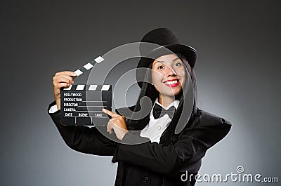 The woman with vintage hat and movie board Stock Photo