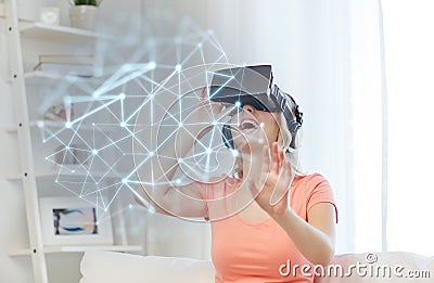 Woman in virtual reality headset or 3d glasses Stock Photo