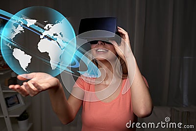 Woman in virtual reality headset or 3d glasses Stock Photo