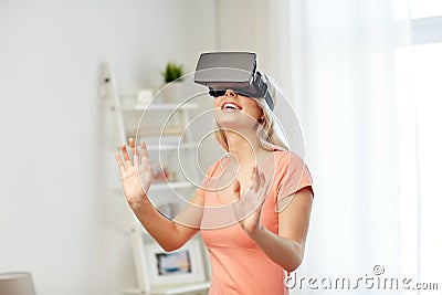 Woman in virtual reality headset or 3d glasses Stock Photo