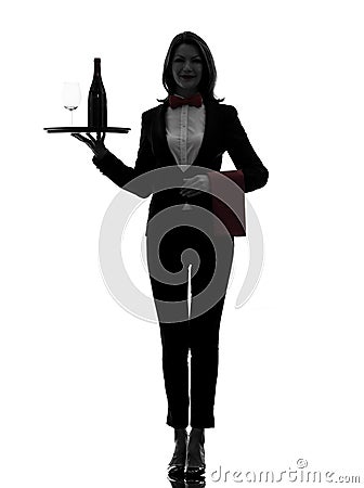 Woman waiter butler serving red wine silhouette Stock Photo