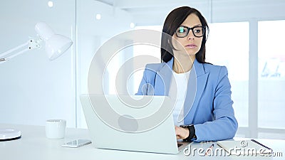 Woman Waiting for Meeting, Watching Time on smartwatch Stock Photo