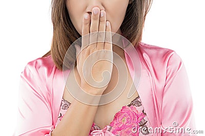 The woman wake up in the morning and quickly cover your mouth w Stock Photo